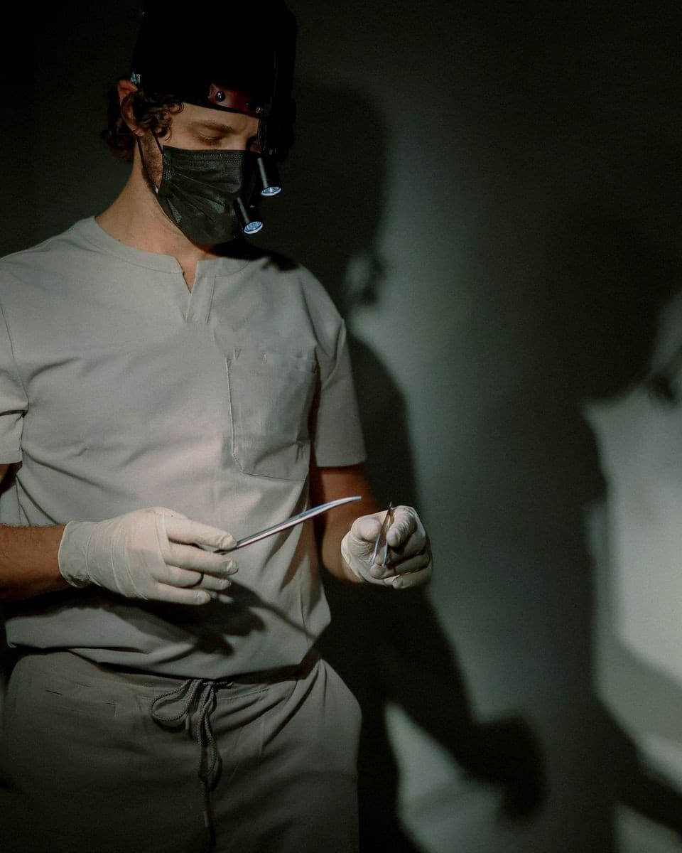 Warm film-toned editorial portrait representing the services offered at Manning Facial Plastic Surgery.
